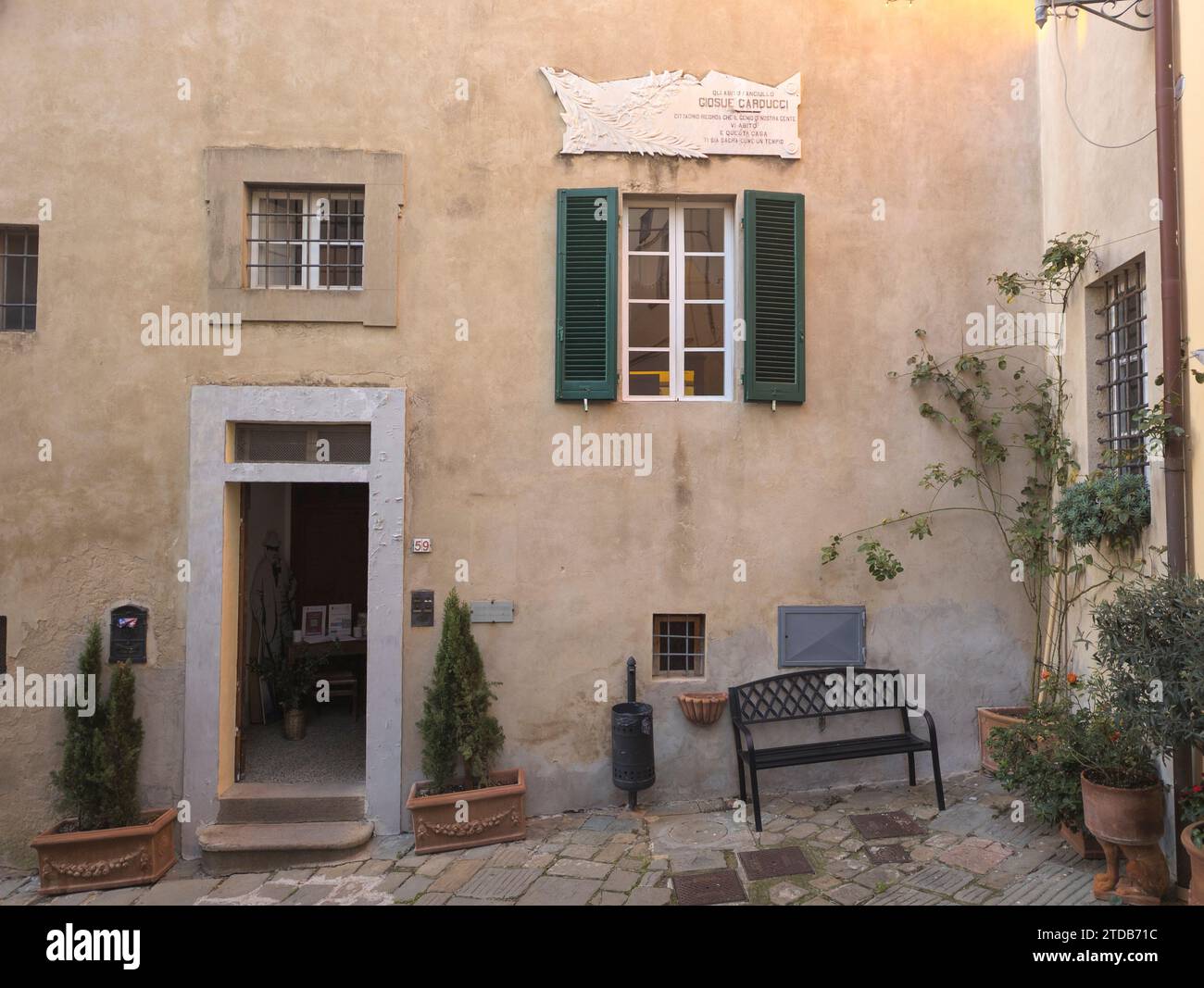 Commemorative plaque of the poet Carducci: the Italian poet Giosuè Carducci lived here as a child. Castagneto Carducci, Tuscany, Italy Stock Photo