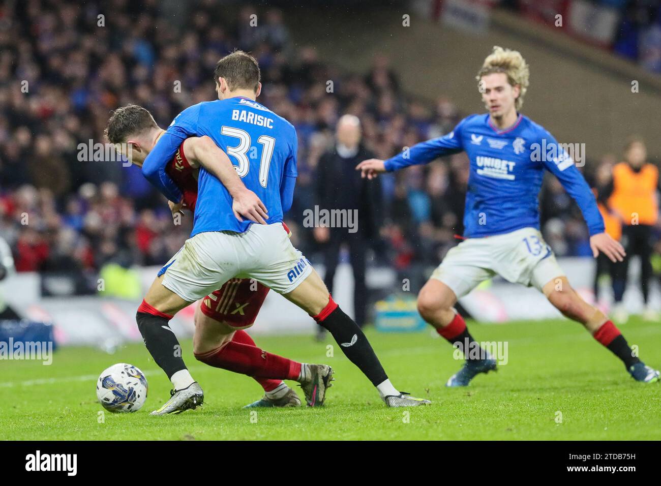 Glasgow, UK. 17th Dec, 2023. In the final of the 2023/2024 Viaplay Cup football competition, Rangers played Aberdeen at Hampden Park, the Scottish FA National Stadium. Rangers won 1 - 0, with the winning goal being scored by James Tavernier, (Rangers 2) the Rangers Captain, with an assist by Borna Barisic, (Rangers 31) in 78 minutes. Credit: Findlay/Alamy Live News Stock Photo