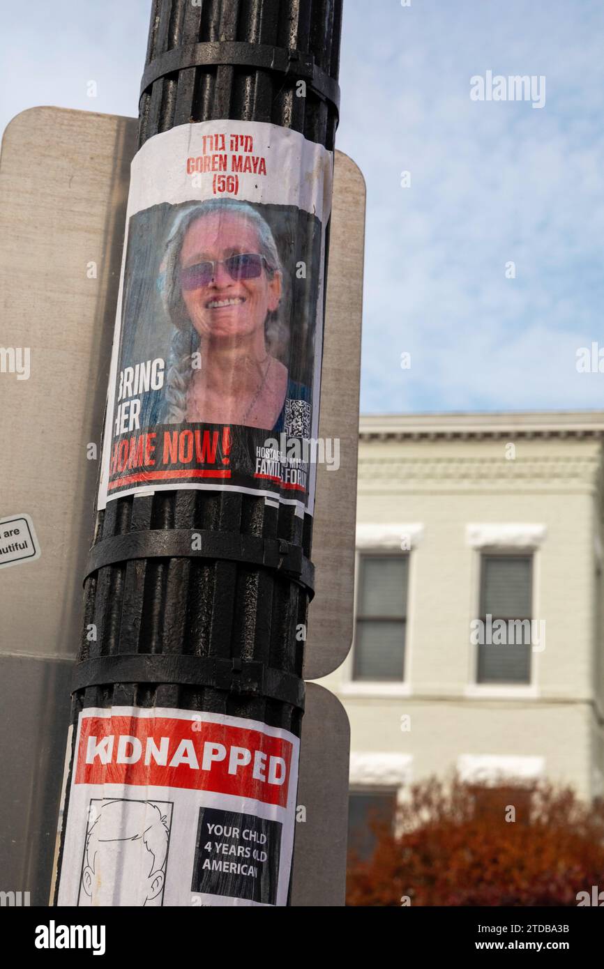 Washington, DC - Posters with the names and faces of Israelis kidnapped and held hostage by Hamas on October 7, 2023. Stock Photo