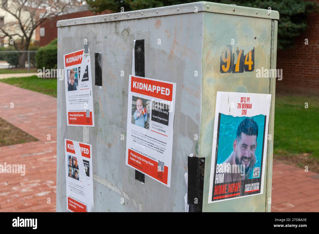 Washington, DC - Posters with the names and faces of Israelis kidnapped and held hostage by Hamas on October 7, 2023. Some have been defaced. Stock Photo