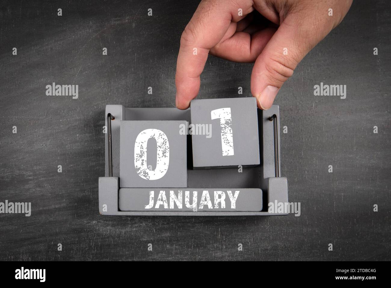 January 1. Black scratched textured chalkboard background. Stock Photo