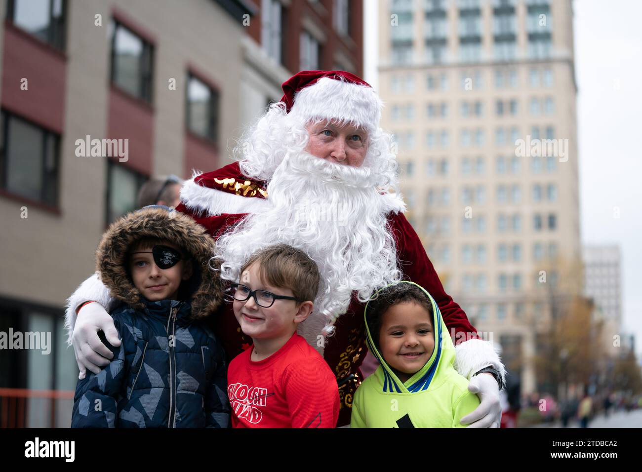 Santa Claus poses for a photo during the 2023 Lexington Christmas
