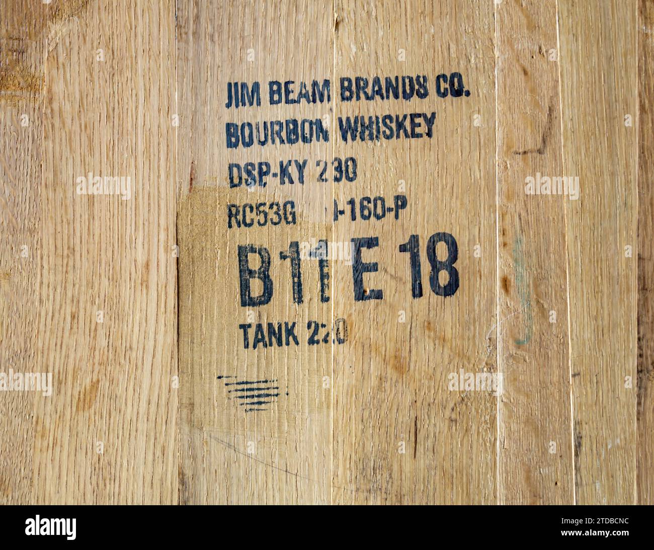 detail image of words, codes and numbers ona a jim beam oak barrel Stock Photo