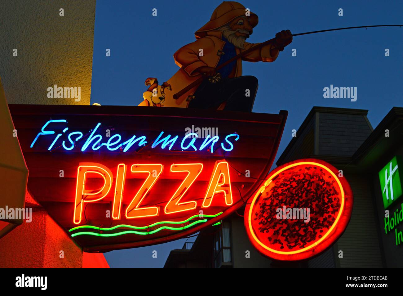 A pizza shop near Fisherman’s Wharf in San Francisco utilizes a nautical theme for their neon lights sign Stock Photo