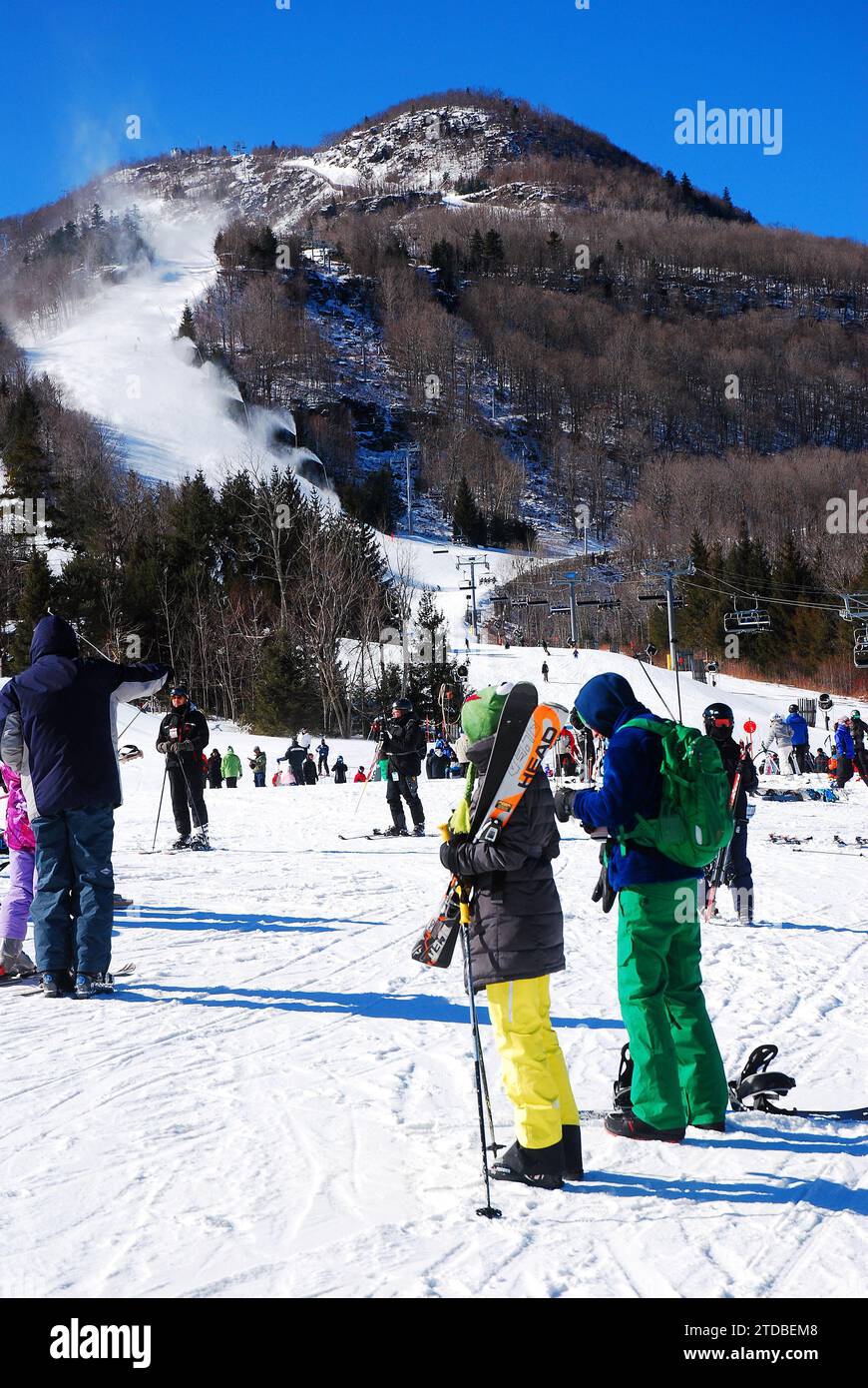 A group of skiers prepare to take on the slopes Stock Photo