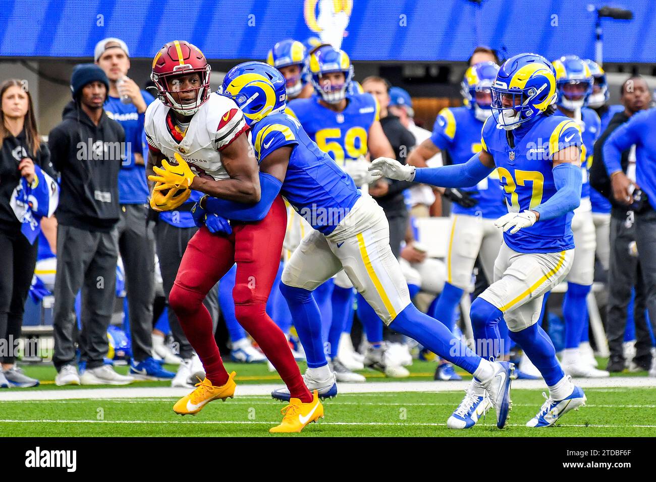 Inglewood, CA. 17th Dec, 2023. Washington Commanders wide receiver Byron Pringle (3) makes the reception tackled by Los Angeles Rams cornerback Derion Kendrick (1) in action in the first quarter during the NFL football game against the Washington Commanders.Mandatory Photo Credit: Louis Lopez/Cal Sport Media (Credit Image: © Louis Lopez/Cal Sport Media). Credit: csm/Alamy Live News Stock Photo