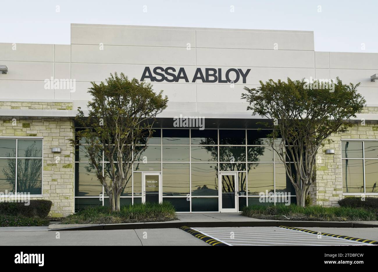 Houston, Texas USA 12-17-2023: Assa Abloy office business storefront exterior in Houston, TX. Swedish automated access entrance systems company. Stock Photo