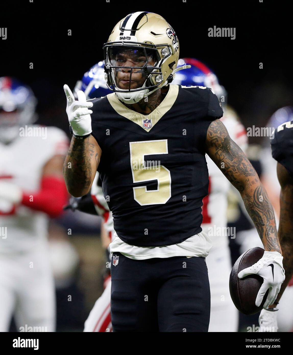 New Orleans Saints wide receiver Lynn Bowden Jr. (5) signals a first