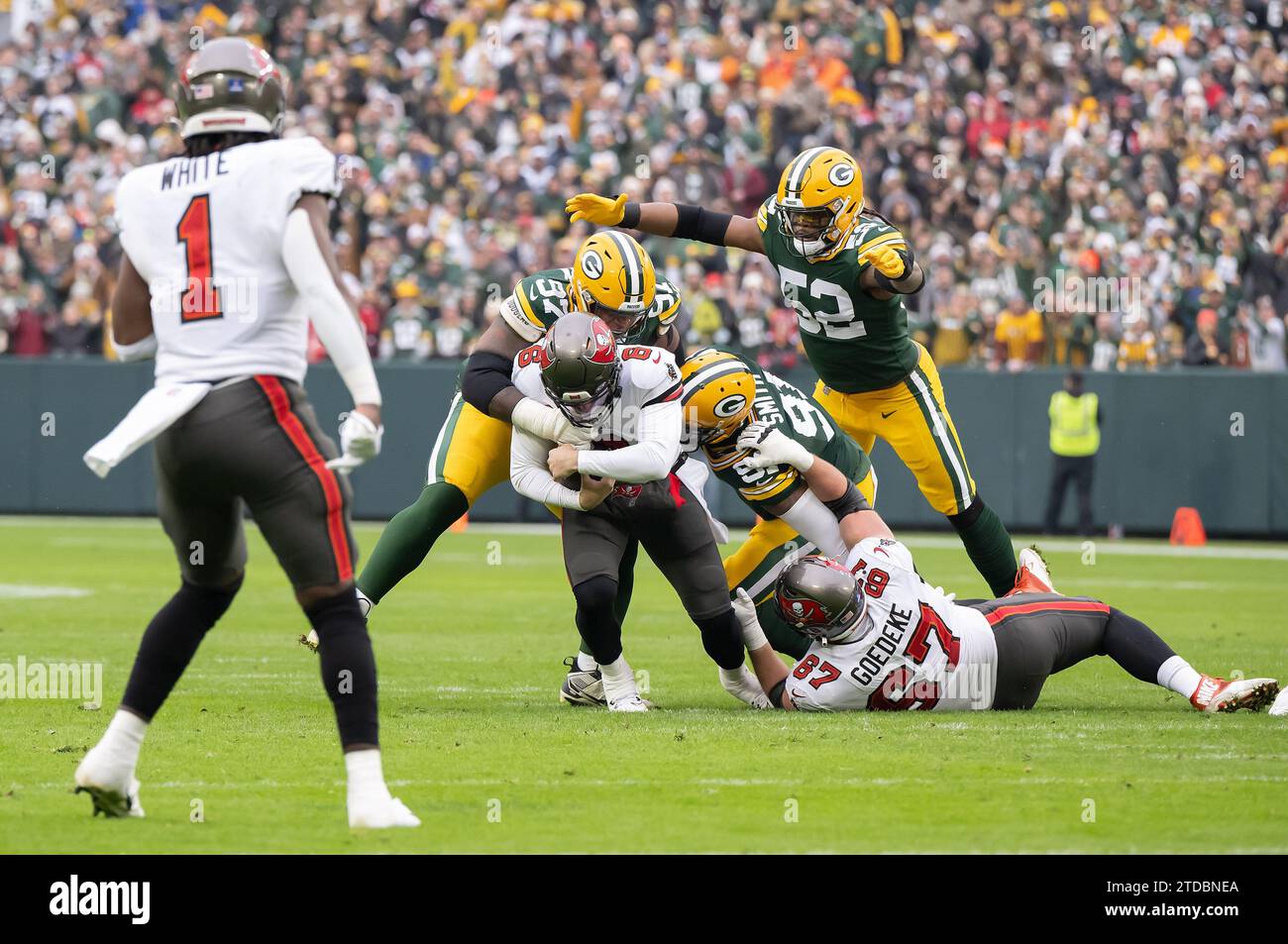 Green Bay, WI, USA. 17th Dec, 2023. Green Bay Packers defensive tackle Kenny Clark (97) sacks Tampa Bay Buccaneers quarterback Baker Mayfield (6) while Green Bay Packers linebacker Preston Smith (91) and Green Bay Packers linebacker Rashan Gary (52) help against Tampa Bay Buccaneers tight end Payne Durham (87) in Green Bay, WI. Kirsten Schmitt/Cal Sport Media. (Credit Image: © Kirsten Schmitt/Cal Sport Media). Credit: csm/Alamy Live News Stock Photo