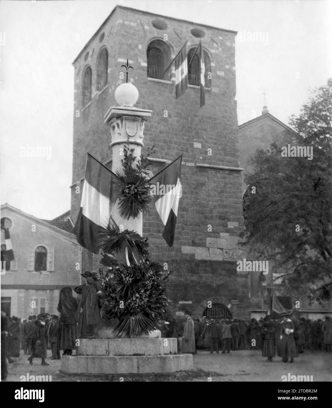 10/31/1918. In Reconquered Italy. The famous tower of San Justo, in Trieste, on the day of the entry of the Italians into the City. - Approx date. Credit: Album / Archivo ABC Stock Photo