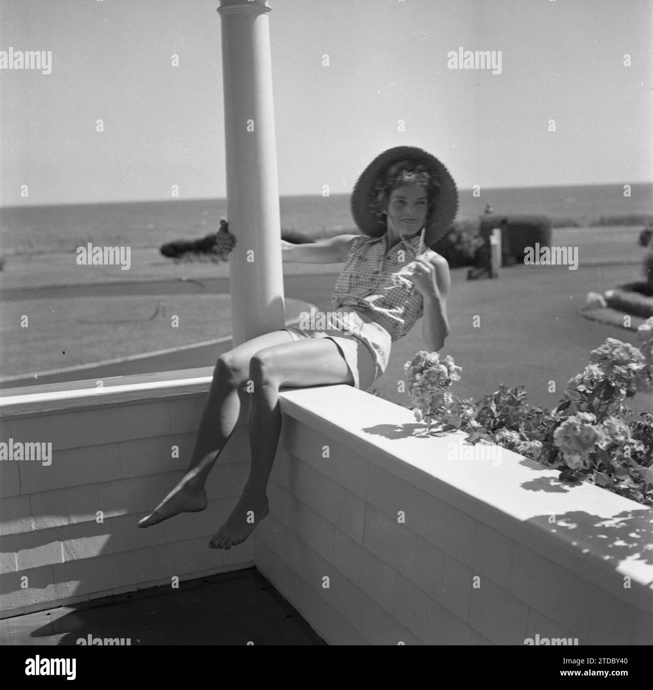 HYANNIS PORT, MA  - JUNE 1953:  Jacqueline Bouvier on vacation at the Kennedy compound in June 1953 in Hyannis Port, Massachusetts. (Photo by Hy Peskin) Stock Photo