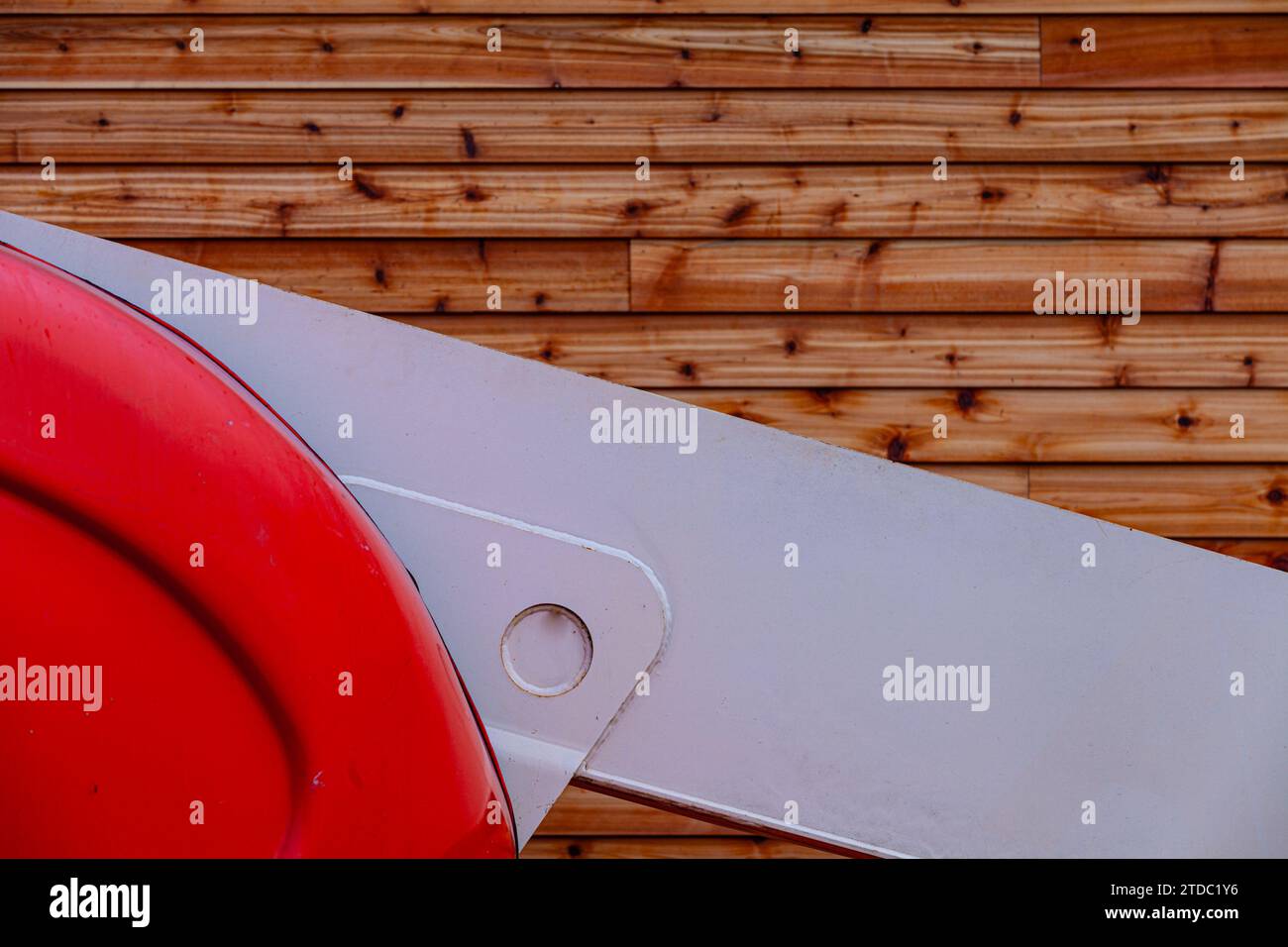 Abstract image of an industrial machine against a wood background in Steveston British Columbia Canada Stock Photo