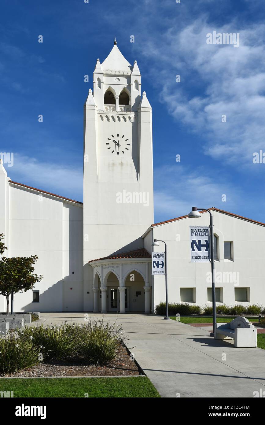 NEWPORT BEACH, CALIFORNIA - 17 DEC 2023: Clock Tower and administration Building at Newport Harbor High School. Stock Photo