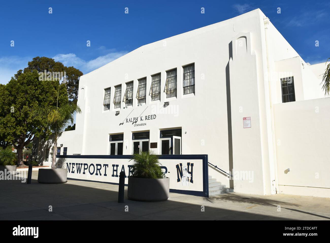 NEWPORT BEACH, CALIFORNIA - 17 DEC 2023: The Ralph Reed Gymnasium on the campus of Newport Harbor High School. Stock Photo