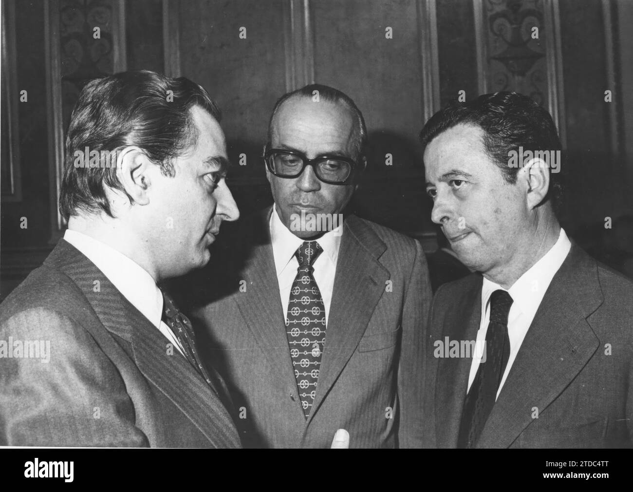 03/16/1981. Plenary session of the congress began yesterday afternoon, behind closed doors, with the report of the minister of defense on the attempted coup d'état of February 23. Mr. Calvo-Sotelo talks with the head of the Chamber, Mr. Lavilla, and with the Minister of Defense, Mr. Oliart, at the end of this first part of the plenary session. Credit: Album / Archivo ABC / Teodoro Naranjo Domínguez Stock Photo