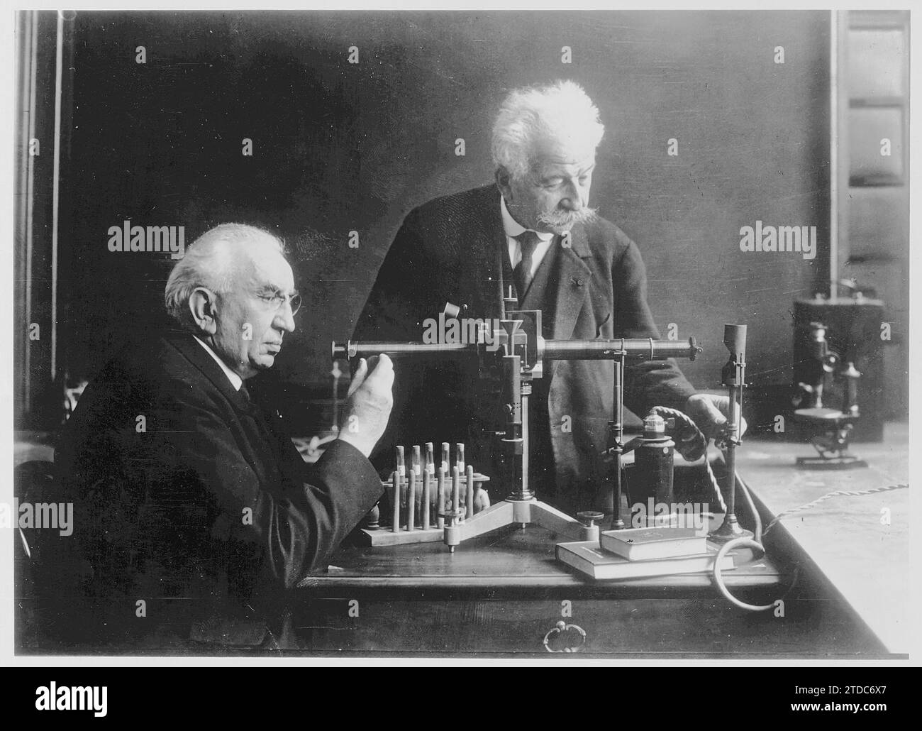 12/31/1929. The Lumière Brothers in their Laboratory. On the left Louis, on the right Auguste. Credit: Album / Archivo ABC Stock Photo