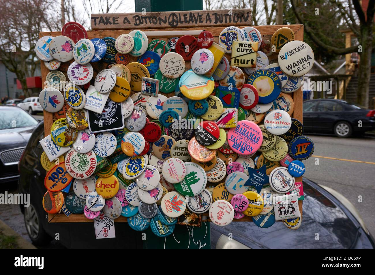 Various protest and other buttons displayed outdoors, Vancouver, BC ...