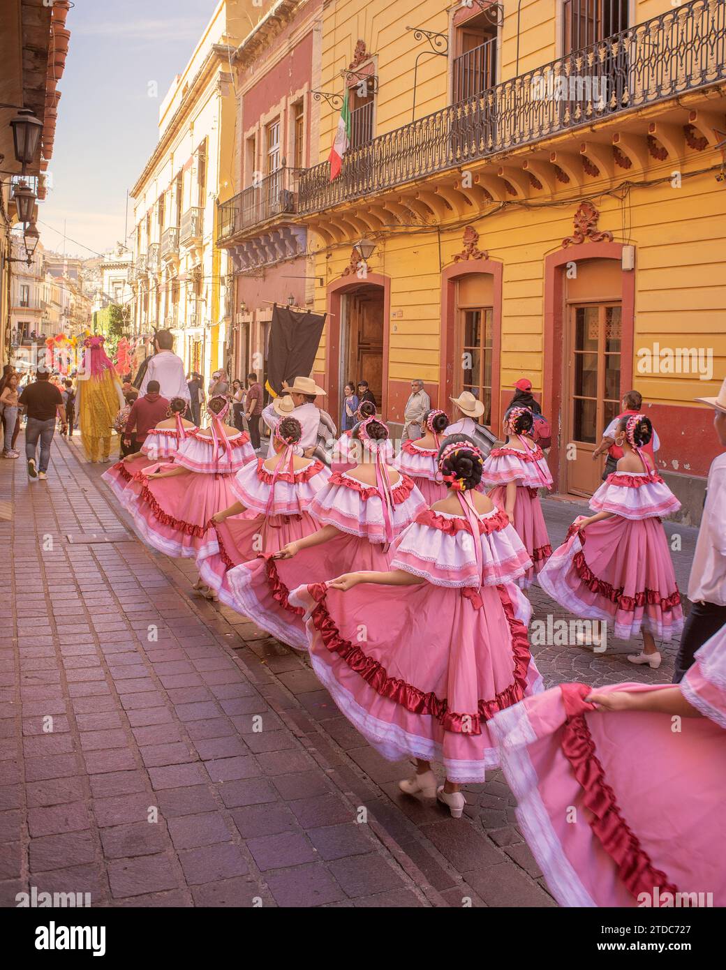 Guanajuato, Guanajuato, Mexico, 06 11 22, Street parade of traditional music by group of dancers in regional costumes, walk through the city center Stock Photo