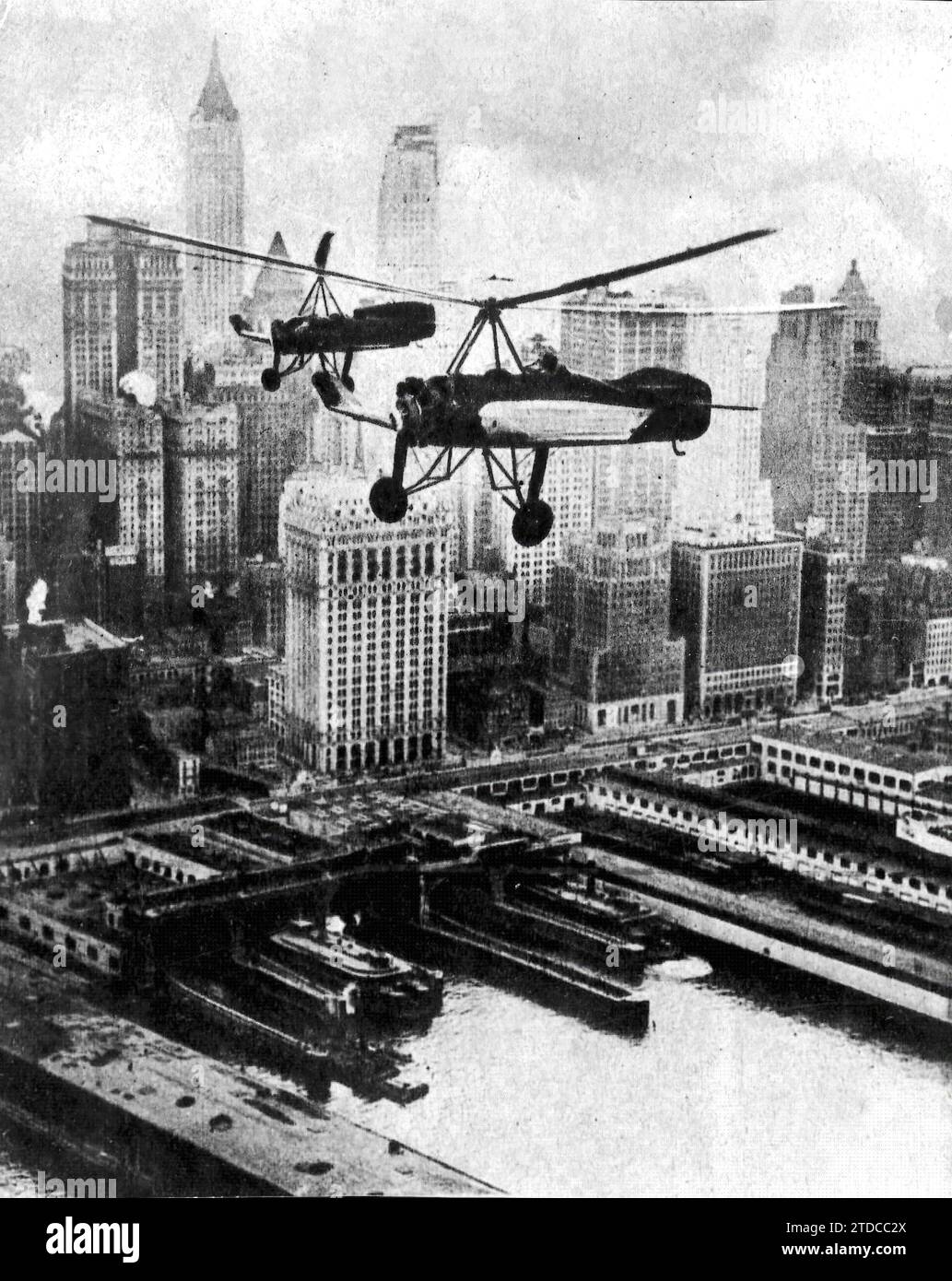 12/31/1929. Juan de La Cierva's autogyro flying over New York. Credit: Album / Archivo ABC Stock Photo