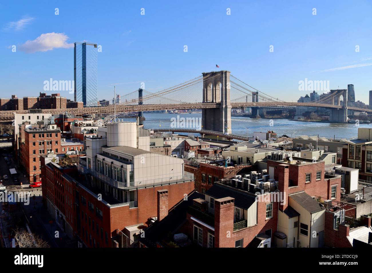 Brooklyn Bridge and Manhattan Bridge seen over the old South Street Seaport district in lower Manhattan, New York Stock Photo