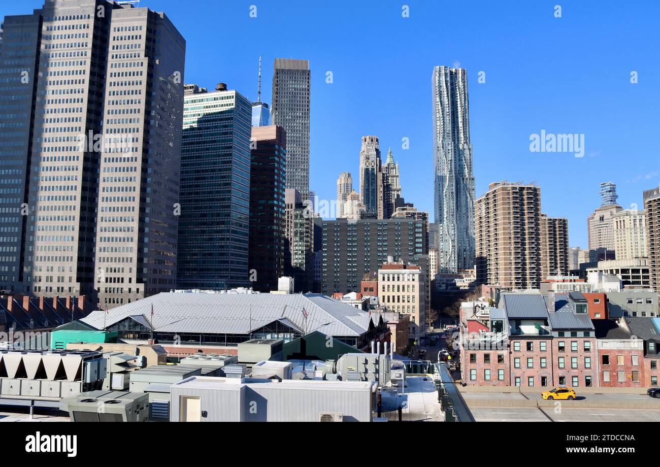 The roofs of Tin building and Fulton market building with Frank Gehry's tower and Southbridge