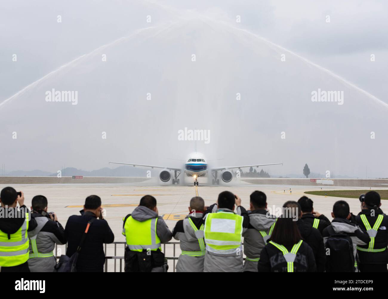 Beijing, China's Sichuan Province. 17th Dec, 2023. China Southern Airlines CZ2281 flight receives a water salute after landing at the Langzhong Gucheng Airport in Nanchong, southwest China's Sichuan Province, Dec. 17, 2023. The airport was put to official operation on Sunday. Credit: Jiang Hongjing/Xinhua/Alamy Live News Stock Photo