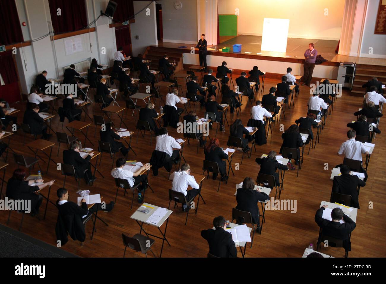 File photo dated 02/03/12 of a maths exam in progress at Pittville High School, Cheltenham. Exams for S4 pupils should be brought forward to allow more study for assessments in S5, the Government has been told. Issue date: Monday December 18, 2023. Stock Photo