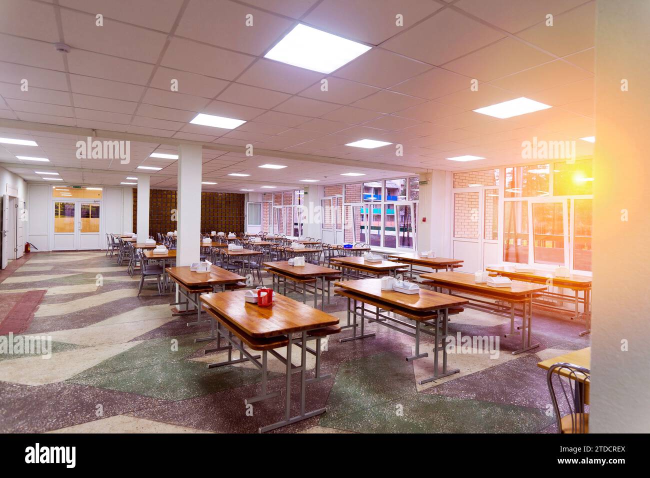 Cafeteria, dining room in university, cafe with tables and chairs