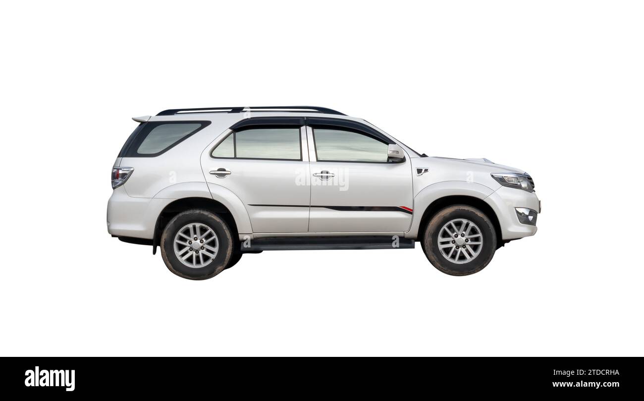 Luxurious white SUV car is isolated on white background with clipping path. Stock Photo