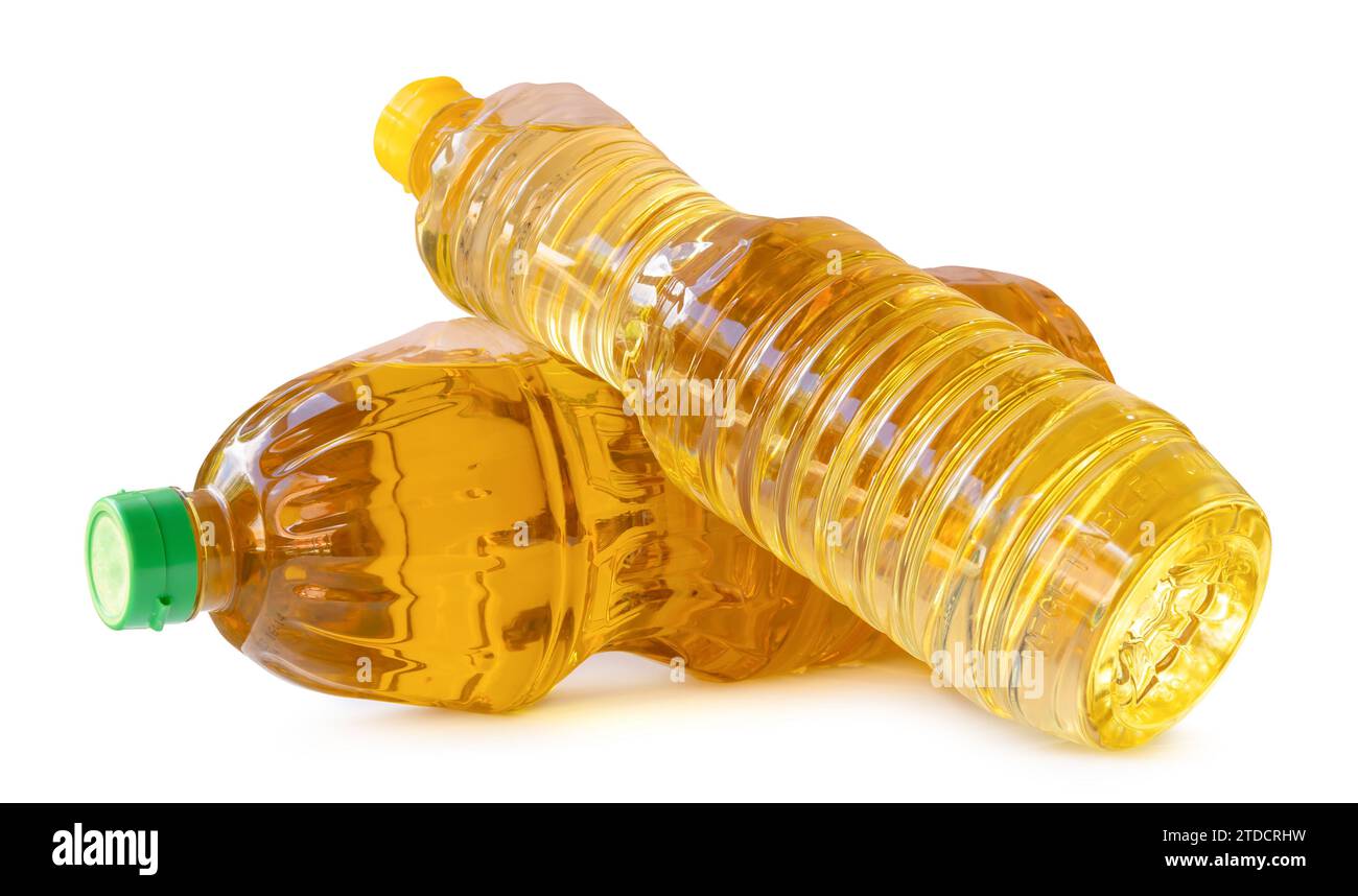 Two bottles of yellow cooking vegetable oil in stack are isolated on