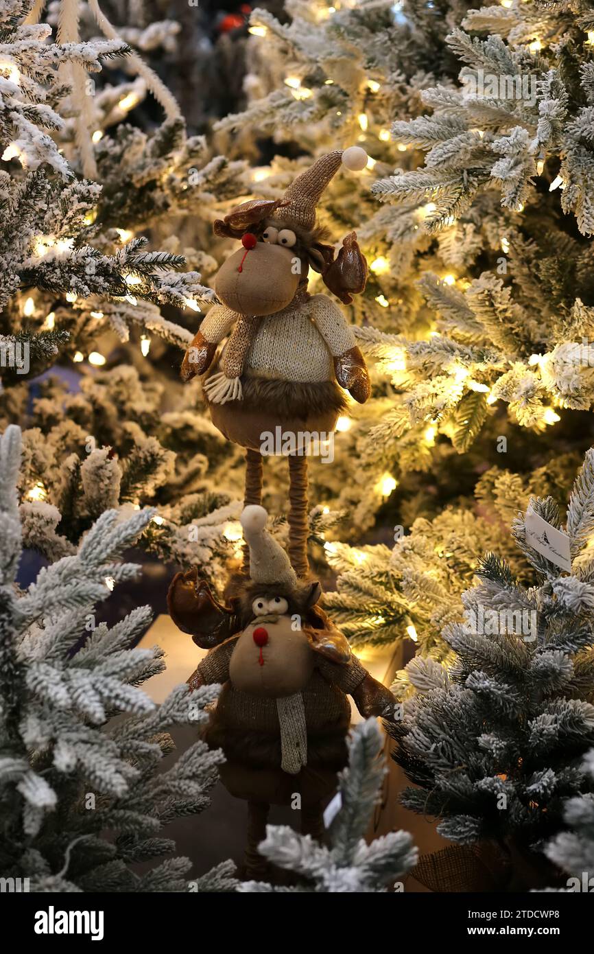 Snow Covered Artificial Christmas Tree with Golden Christmas Lights