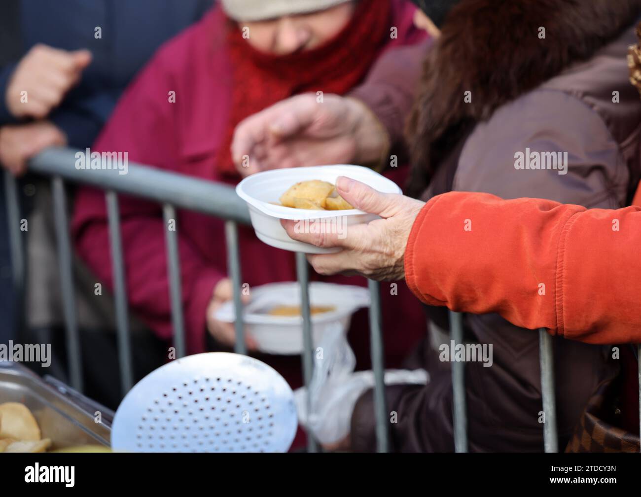 Warm food for the poor and homeless Stock Photo