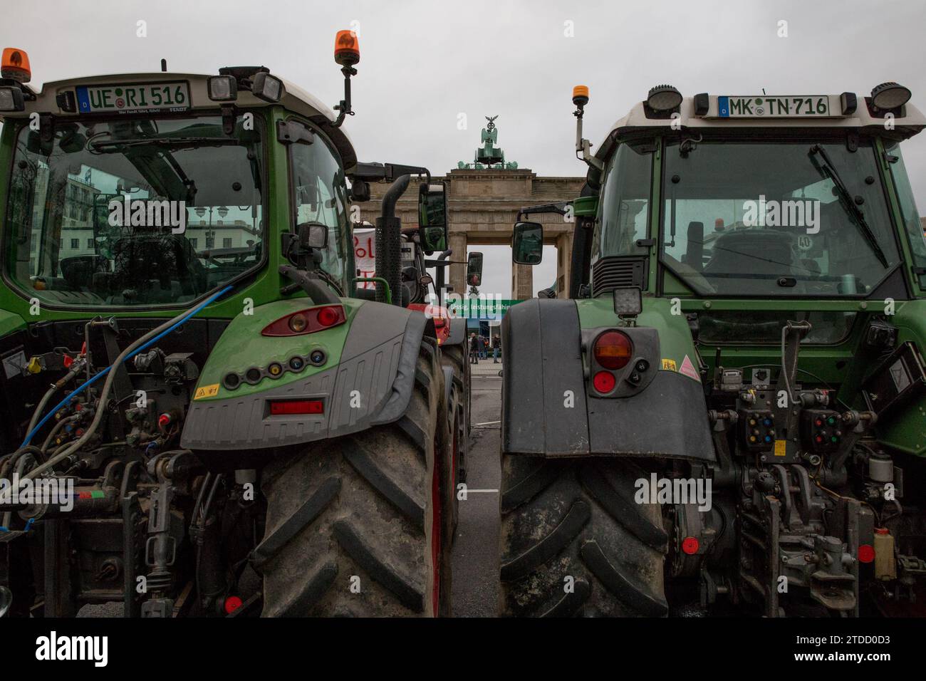 In Berlin on December 18, 2023, thousands of German farmers staged a massive protest against the government's proposed austerity measures, which include slashing diesel subsidies and eliminating vehicle tax exemptions for farmers. Organized by the German Farmers' Association (DBV), the demonstration was anticipated to attract around 3,000 participants nationwide. The DBV has vehemently opposed these cuts, warning that they would deal a severe blow to the agricultural sector, potentially leading to job losses and escalating food prices. Furthermore, the association argues that such measures wou Stock Photo