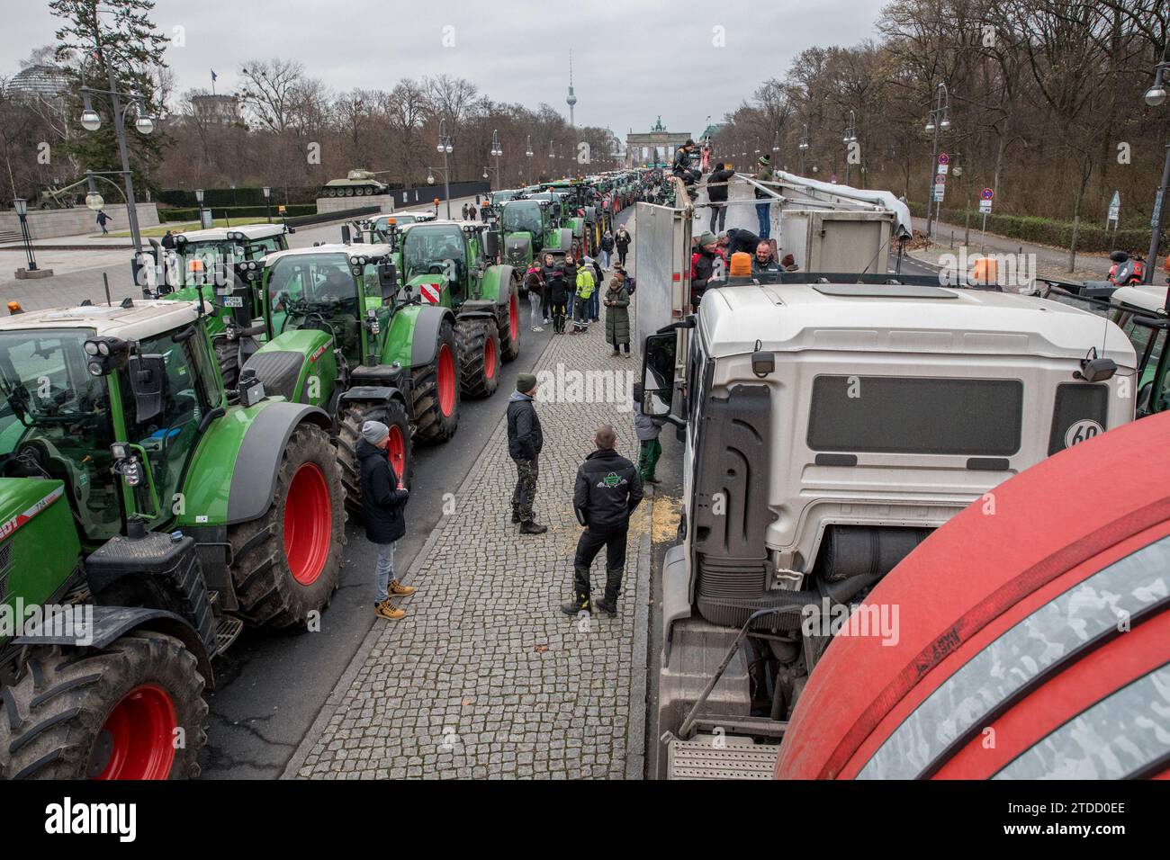 In Berlin on December 18, 2023, thousands of German farmers staged a massive protest against the government's proposed austerity measures, which include slashing diesel subsidies and eliminating vehicle tax exemptions for farmers. Organized by the German Farmers' Association (DBV), the demonstration was anticipated to attract around 3,000 participants nationwide. The DBV has vehemently opposed these cuts, warning that they would deal a severe blow to the agricultural sector, potentially leading to job losses and escalating food prices. Furthermore, the association argues that such measures wou Stock Photo