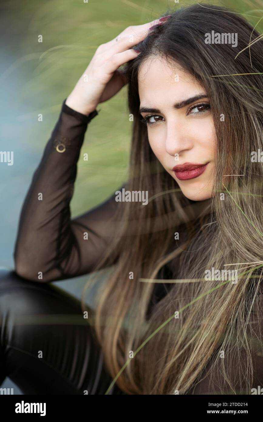 Young beautiful women long dark hi-res stock photography and images - Alamy