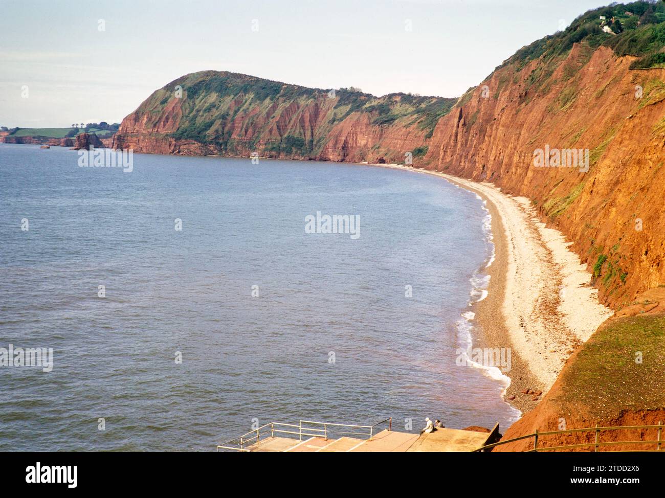 Beach and cliffs in bay, Peak HIll, Sidmouth, Devon, England, UK May