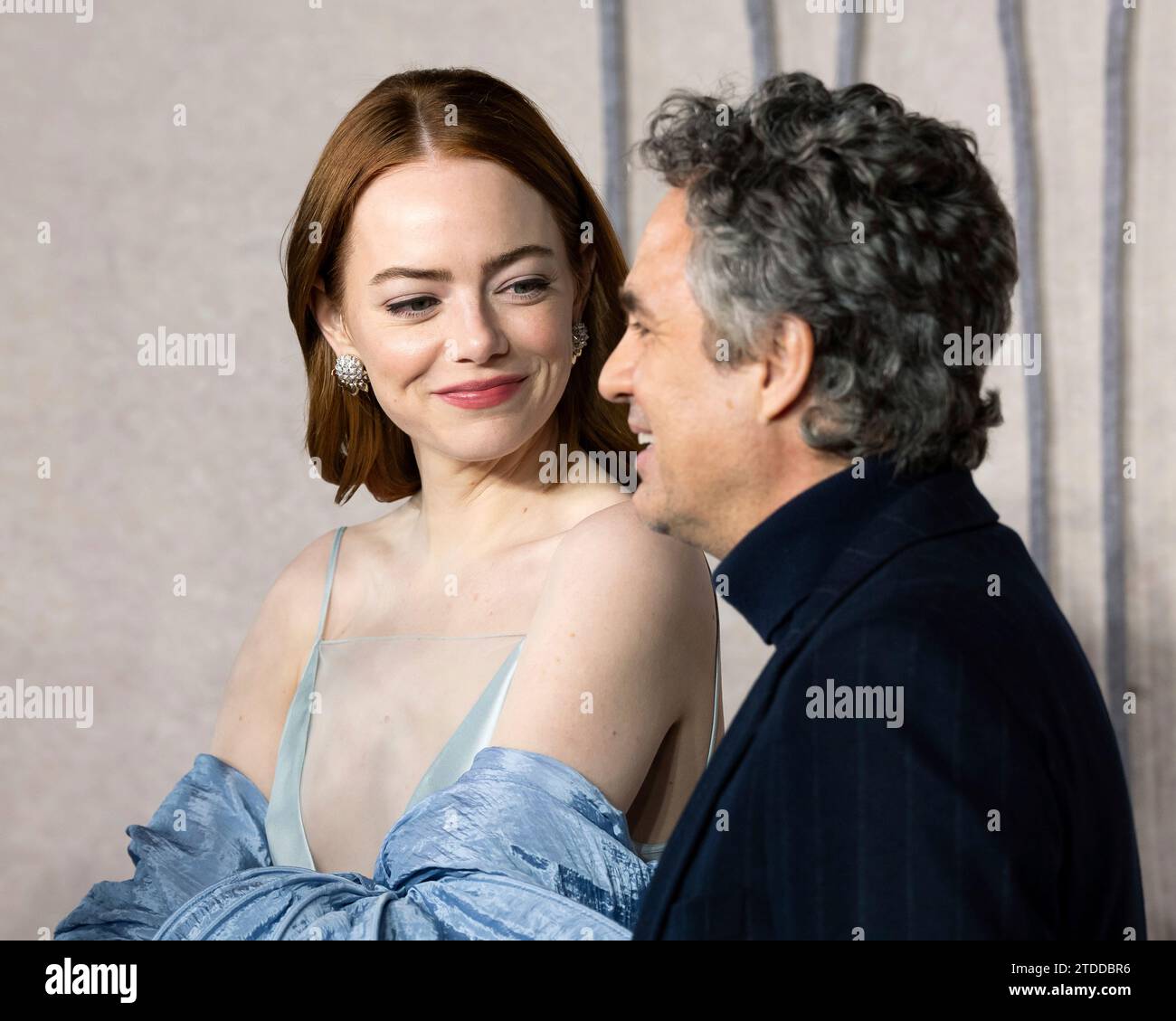 Emma Stone, left, and Mark Ruffalo pose for photographers upon arrival