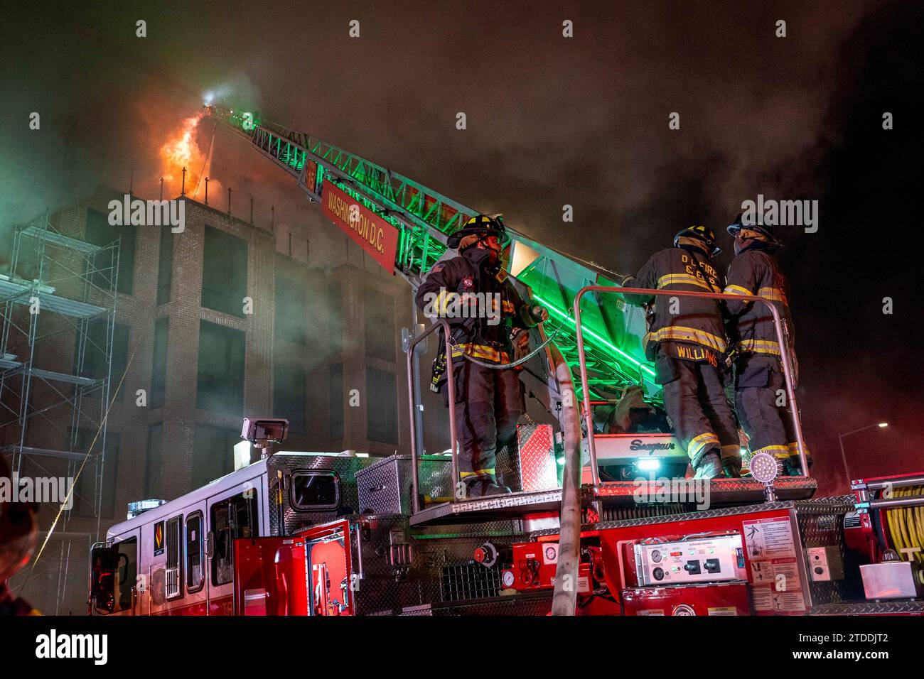 Firefighters battle a two alarm fire that started in a former fire ...