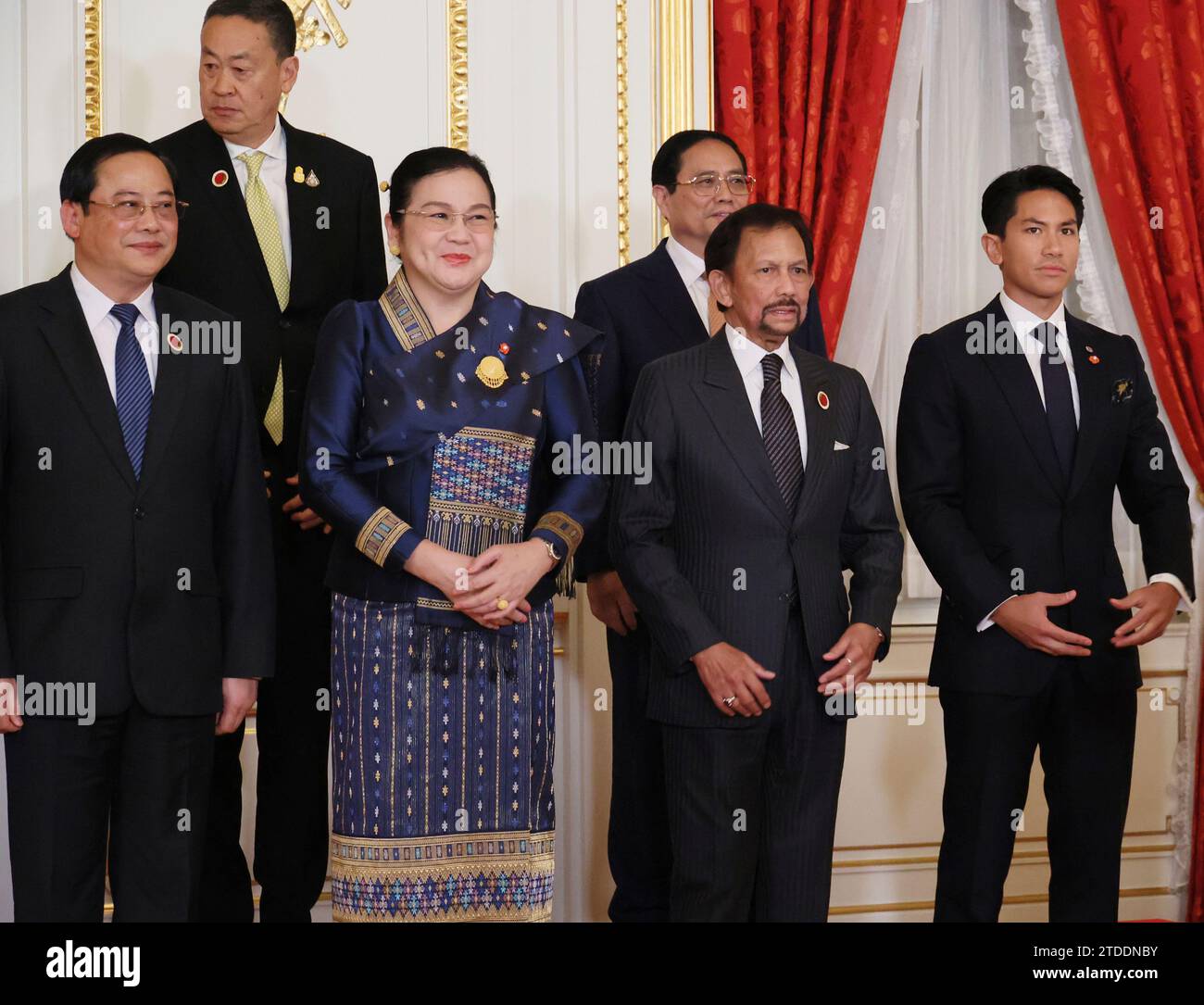 Front from left: Lao Prime Minister Sonexay Siphandone with his wife ...