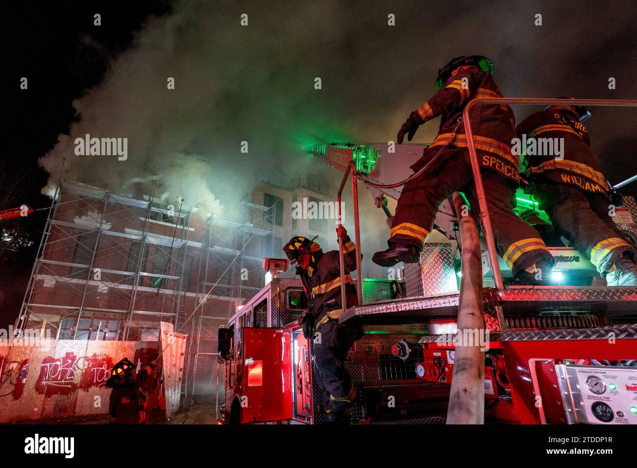 Firefighters battle a two-alarm fire that started in a former fire ...