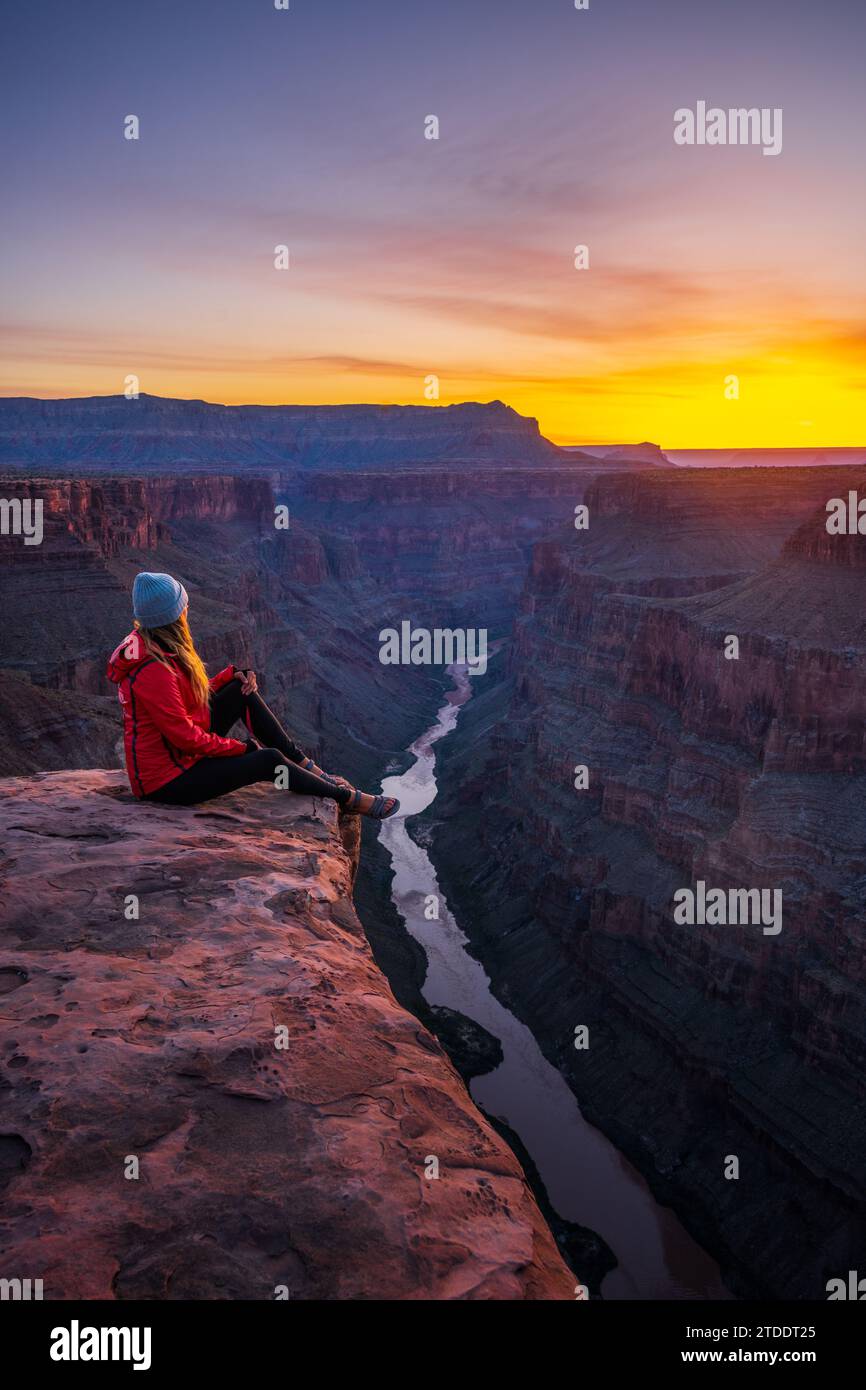 Woman Overlooking the Colorado River in the Grand Canyon Stock Photo