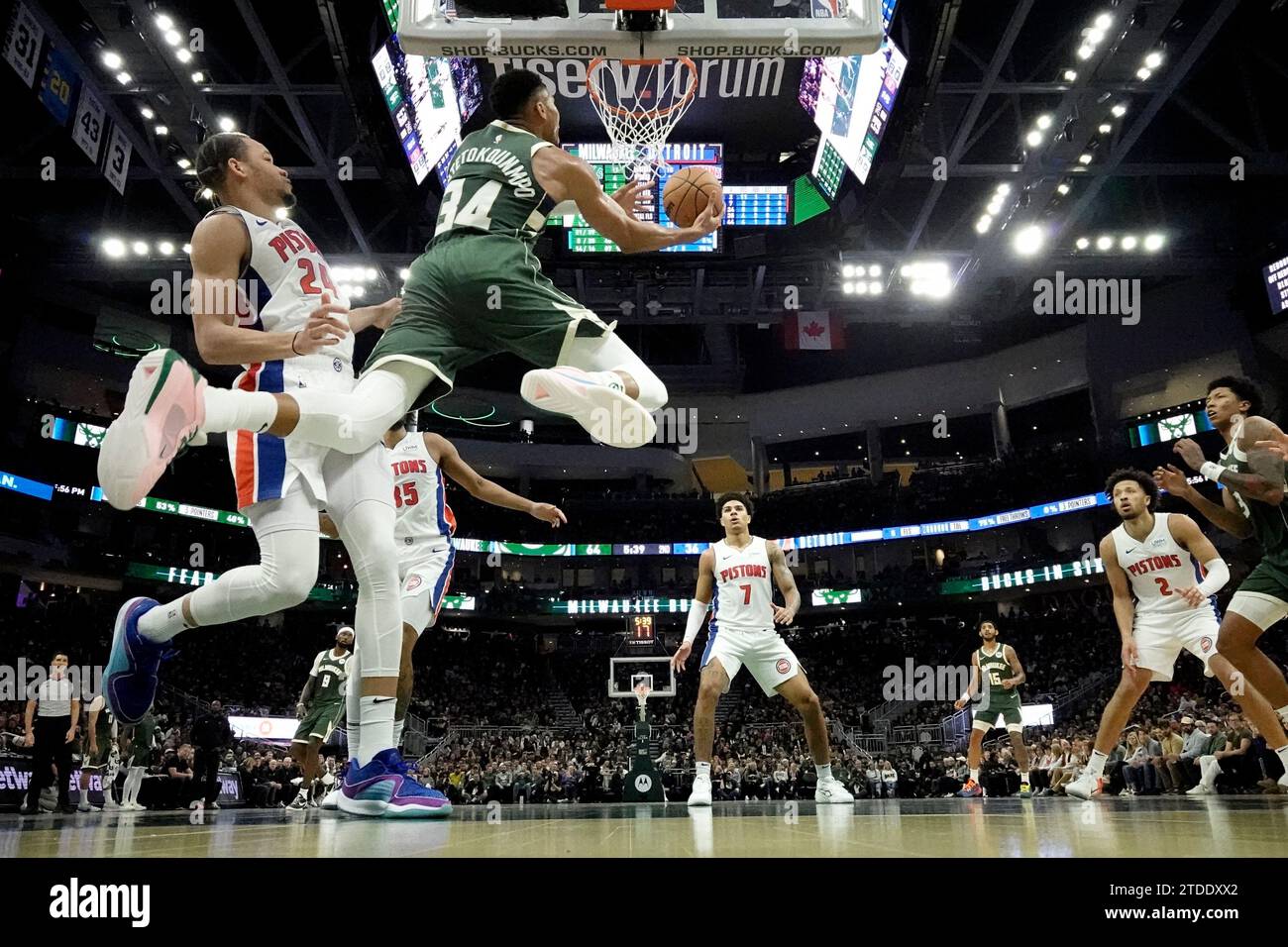 Milwaukee Bucks' Giannis Antetokounmpo shoots past Detroit Pistons