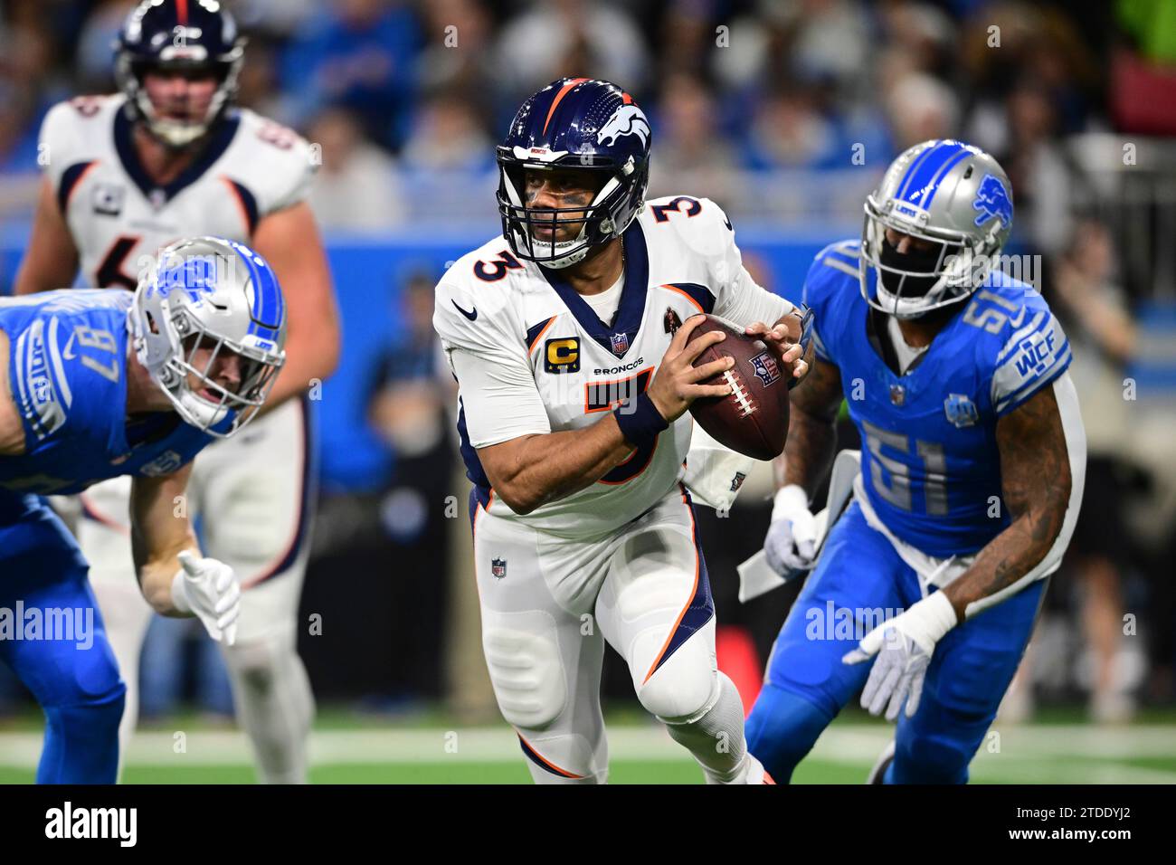 Denver Broncos quarterback Russell Wilson (3) is pressured during the ...