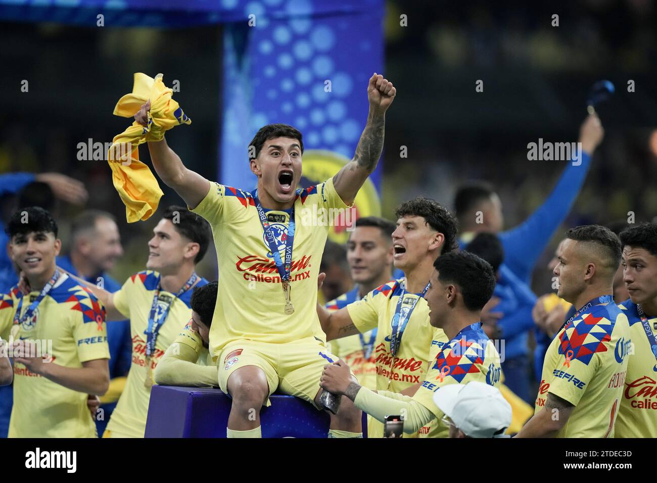 America's players celebrate their victory over Tigres in the Mexican