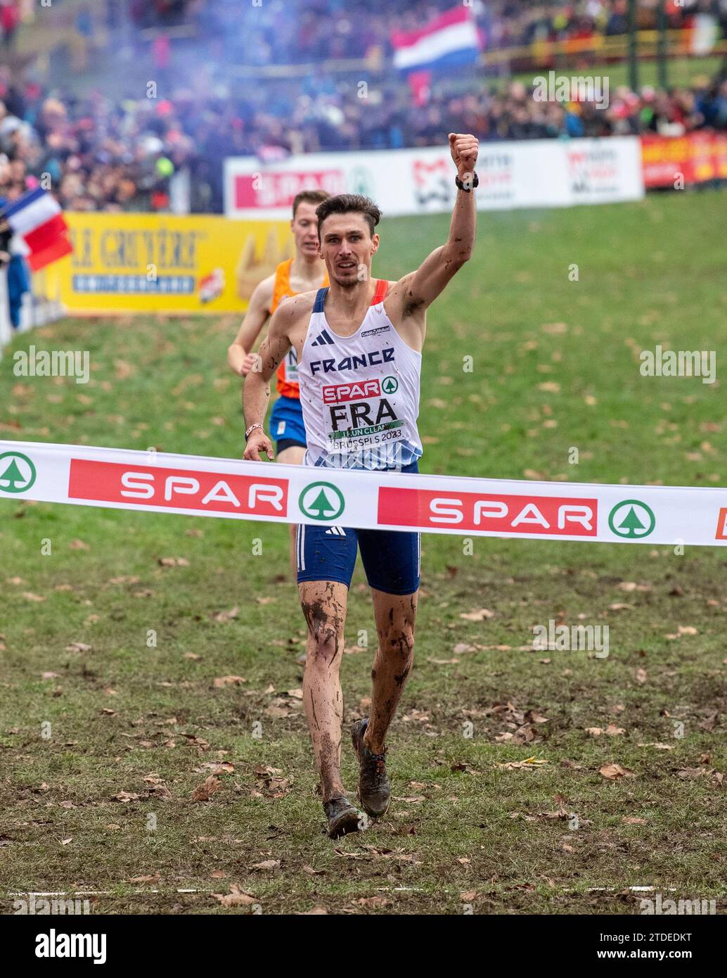 Alexis Miellet of France crosses the finishing line to help his team