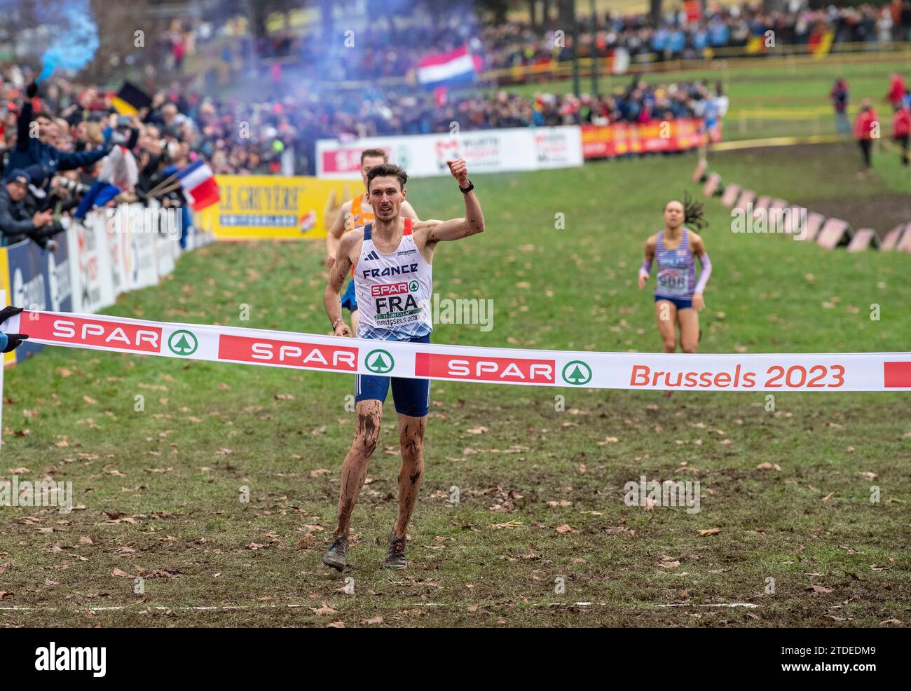 Alexis Miellet of France crosses the finishing line to help his team