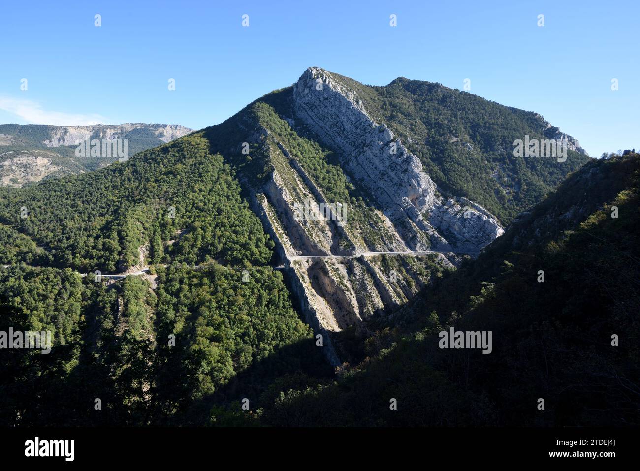 Narrow Mountain Road & Rock Strata in the Clue de Taulanne or Taulanne Ravine in the Geological Reserve of Haute Provence near Castellane  France Stock Photo