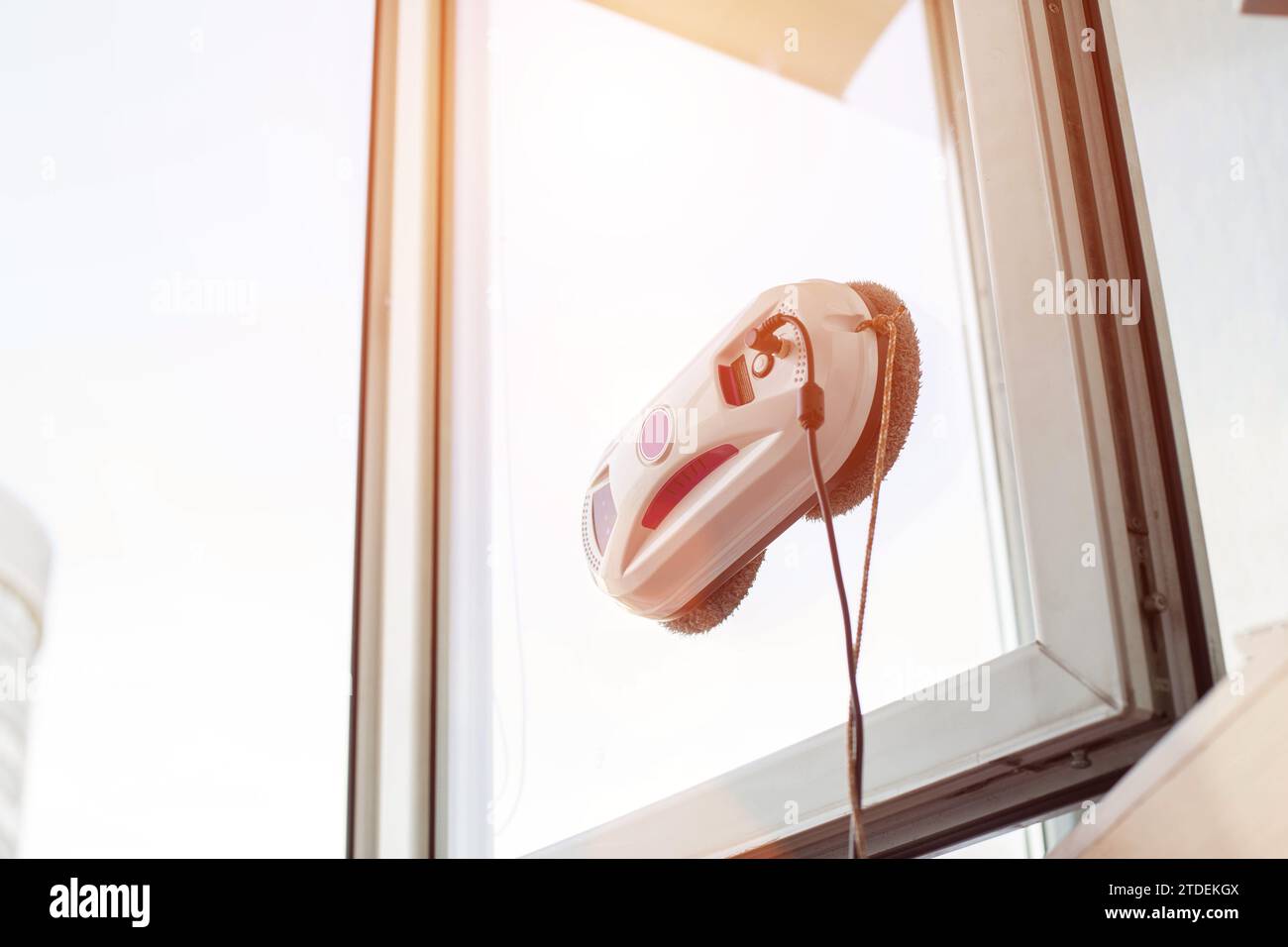 Clean windows safely with a window cleaning robot. Stock Photo