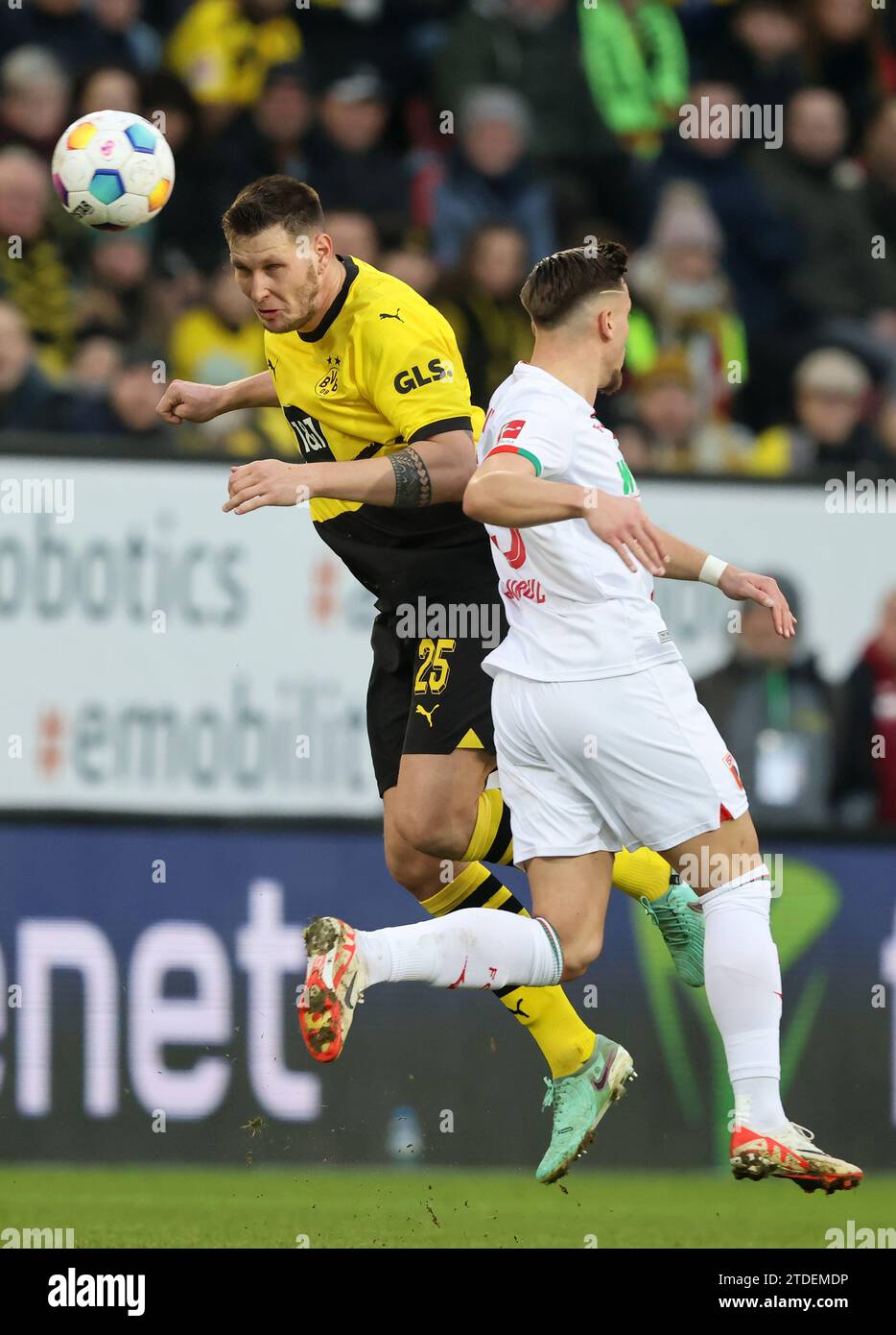 Niklas Suele Of Borussia Dortmund Jeffrey Gruweleeuw Of FC Augsburg FC