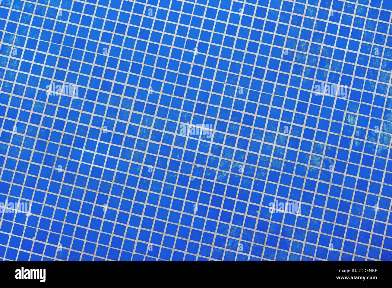 Small blue ceramic tiles in outdoor fountain pool as background and pattern Stock Photo